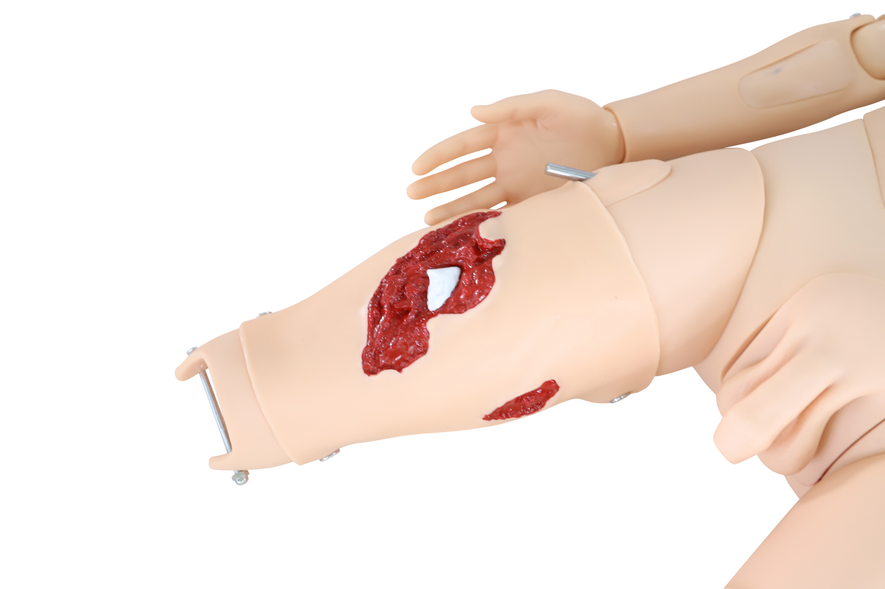 Manikin with multiple bleeding sites and injury simulation