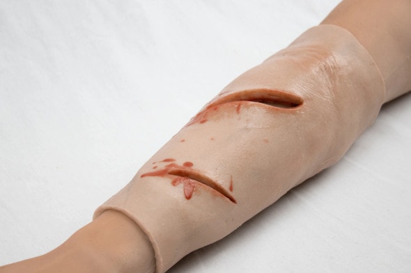 Wearable Suture Practice Arm Sleeve Trainer